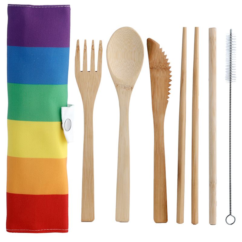 Natural bamboo travel cutlery set with chopsticks and straw in a vibrant rainbow canvas roll pouch