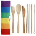 Natural bamboo travel cutlery set with chopsticks and straw in a vibrant rainbow canvas roll pouch
