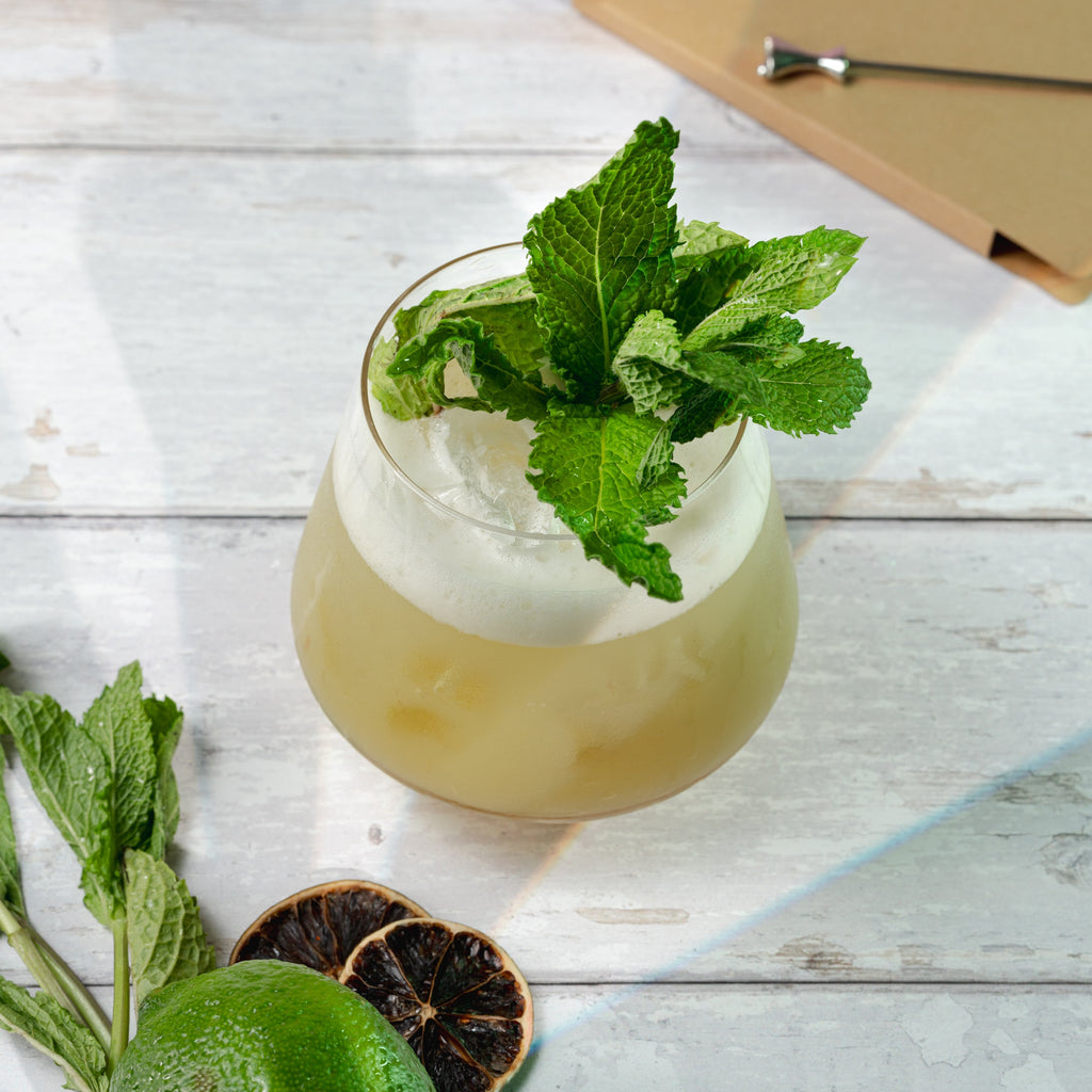 Cucumber jalapeño mojito mix in a 750ml glass bottle with natural green cocktail ingredients — view 5