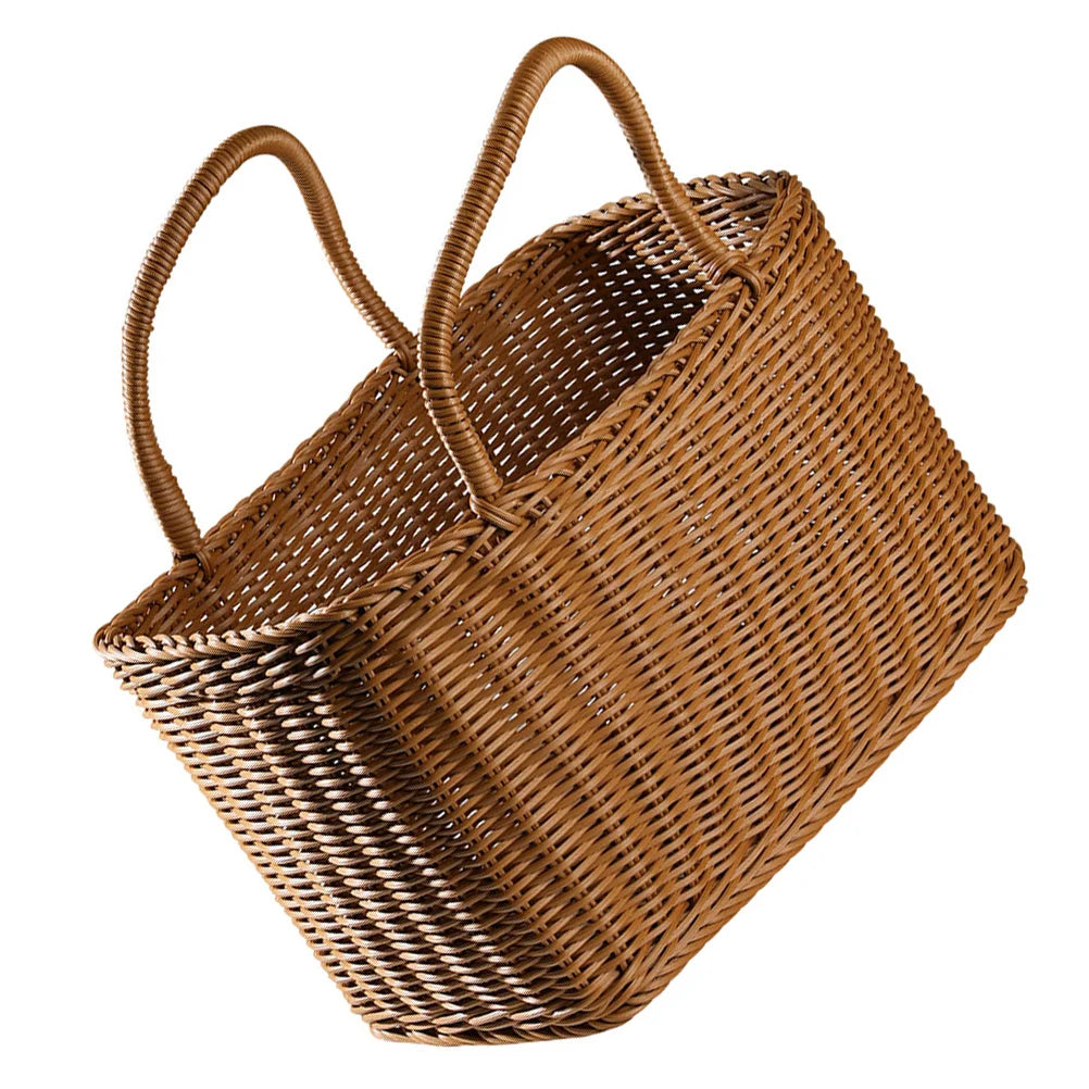 Brown woven wicker basket with handle, stylish retro design for picnics and floral home decor