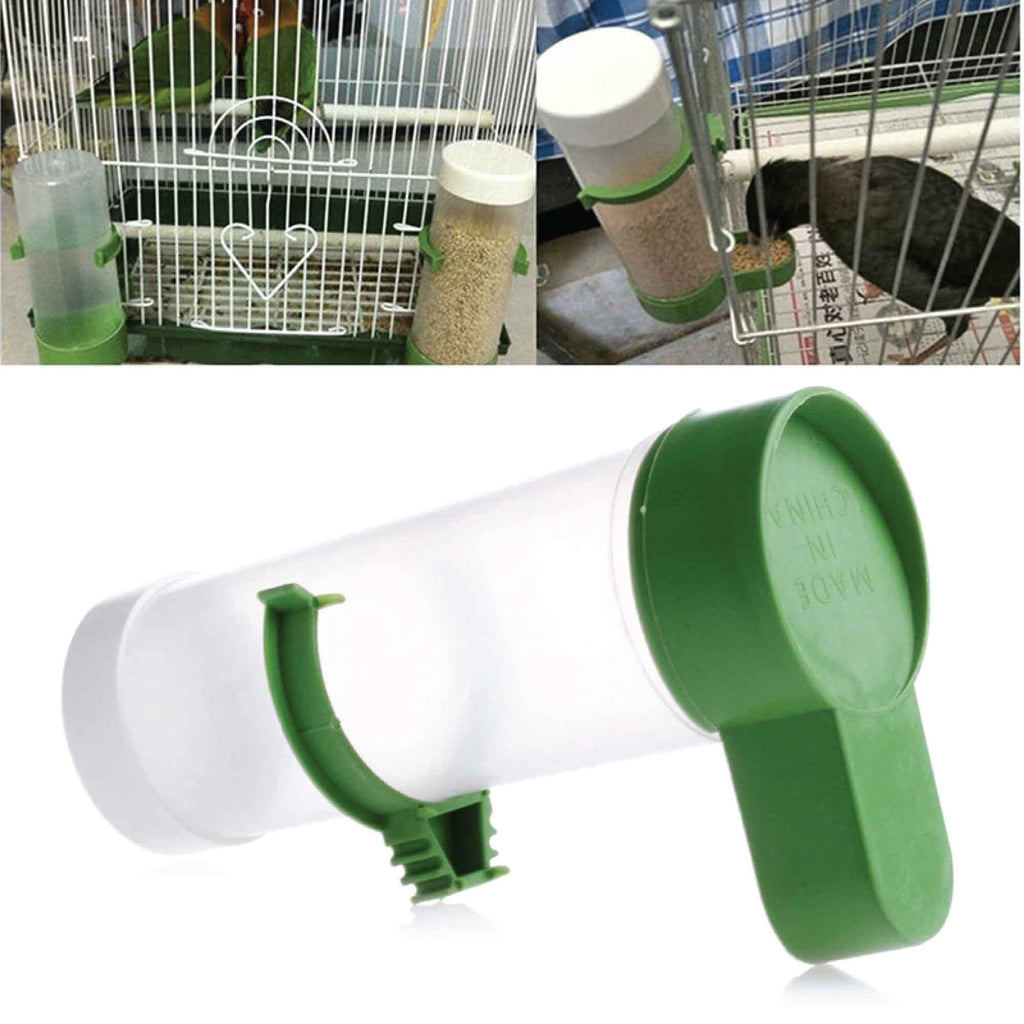 Green and clear plastic automatic bird food dispenser attached to wire cage bars — view 5