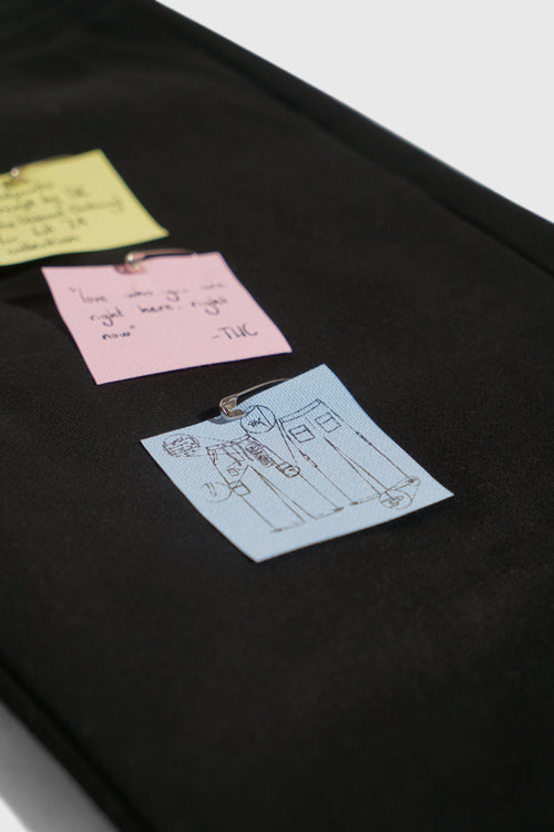 Sticky notes sweatpants in a stacked flared fit with utility pockets and custom interactive detailing — view 3