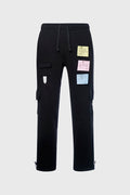 Sticky notes sweatpants in a stacked flared fit with utility pockets and custom interactive detailing