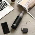 Reusable stainless steel water bottle in sleek matt black finish with an airtight screw lid