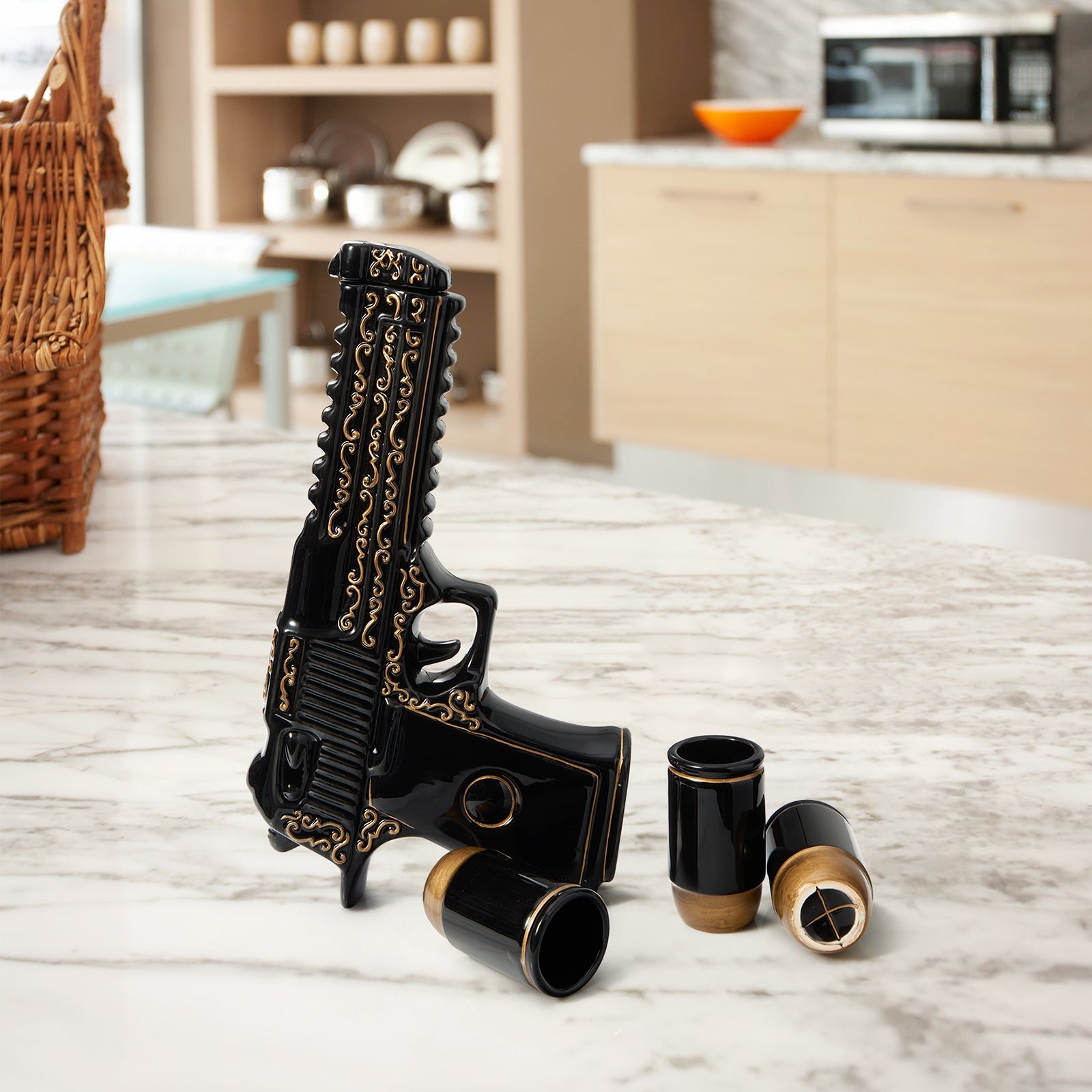 Black hand painted pistol whiskey decanter with three shot glasses on wooden display stand — view 3