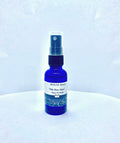 Blue Nile Atum body oil spray bottle with organic cucumber and blueberry seed oil extract