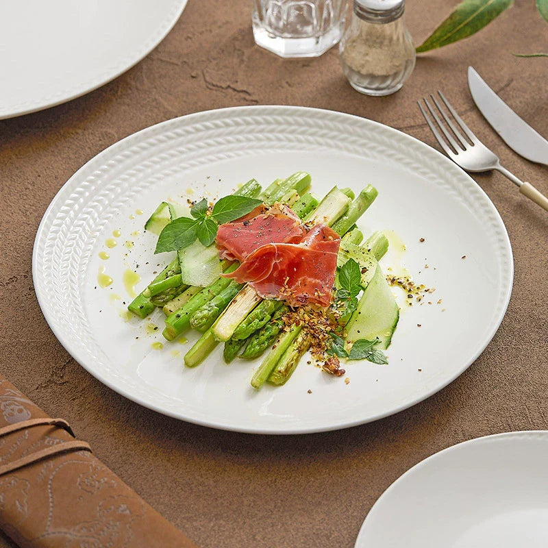 Braided rim white ceramic dinner plate with an embossed textured edge made of high-fired porcelain
