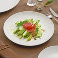 Braided rim white ceramic dinner plate with an embossed textured edge made of high-fired porcelain