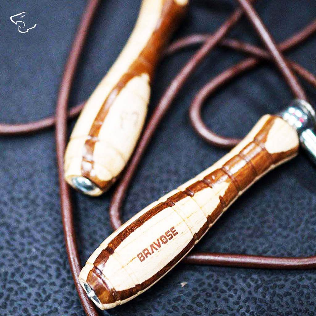 Premium leather skipping rope with ergonomic wooden handles and adjustable nine foot tangle free cord — view 2