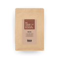 Kraft paper bag of freshly hand roasted Brazil whole coffee beans with a sweet nutty finish