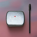 Clear vegan brow styling soap in a compact travel-friendly container for fluffy laminated brows