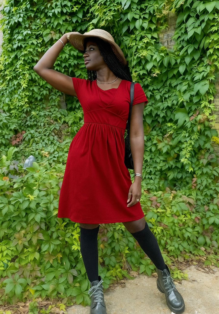 Burgundy red cotton breastfeeding dress with smock silhouette and hidden nursing panels — view 4