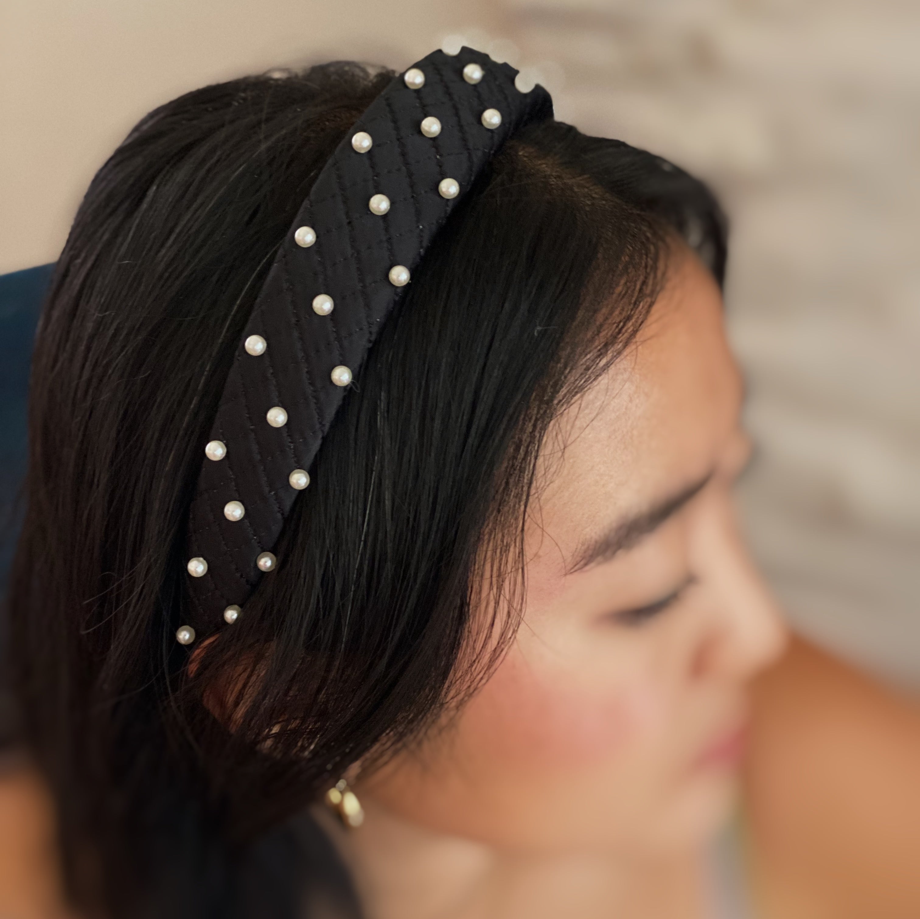 Quilted elegance pearl headband in soft fabric featuring hand-nailed pearls and smooth padded edges — view 5