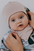 Winter merino baby hat in balaclava style covering the head, ears, and neck.