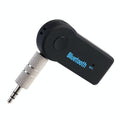 Compact wireless Bluetooth audio receiver in sleek disc design for car stereos and headphones.
