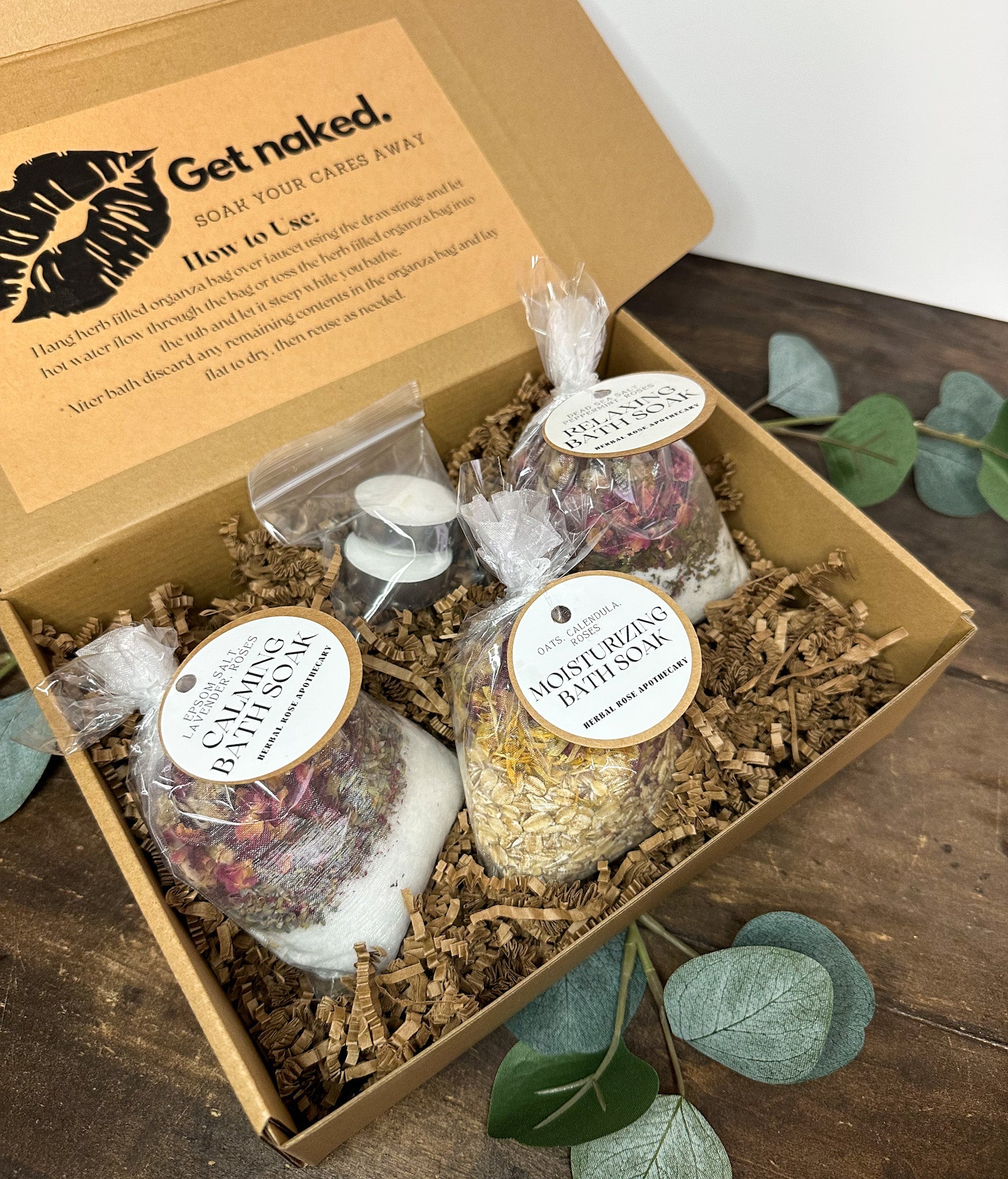 Botanical bath gift set box featuring herbal salt soaks natural flower petals and tea light candles