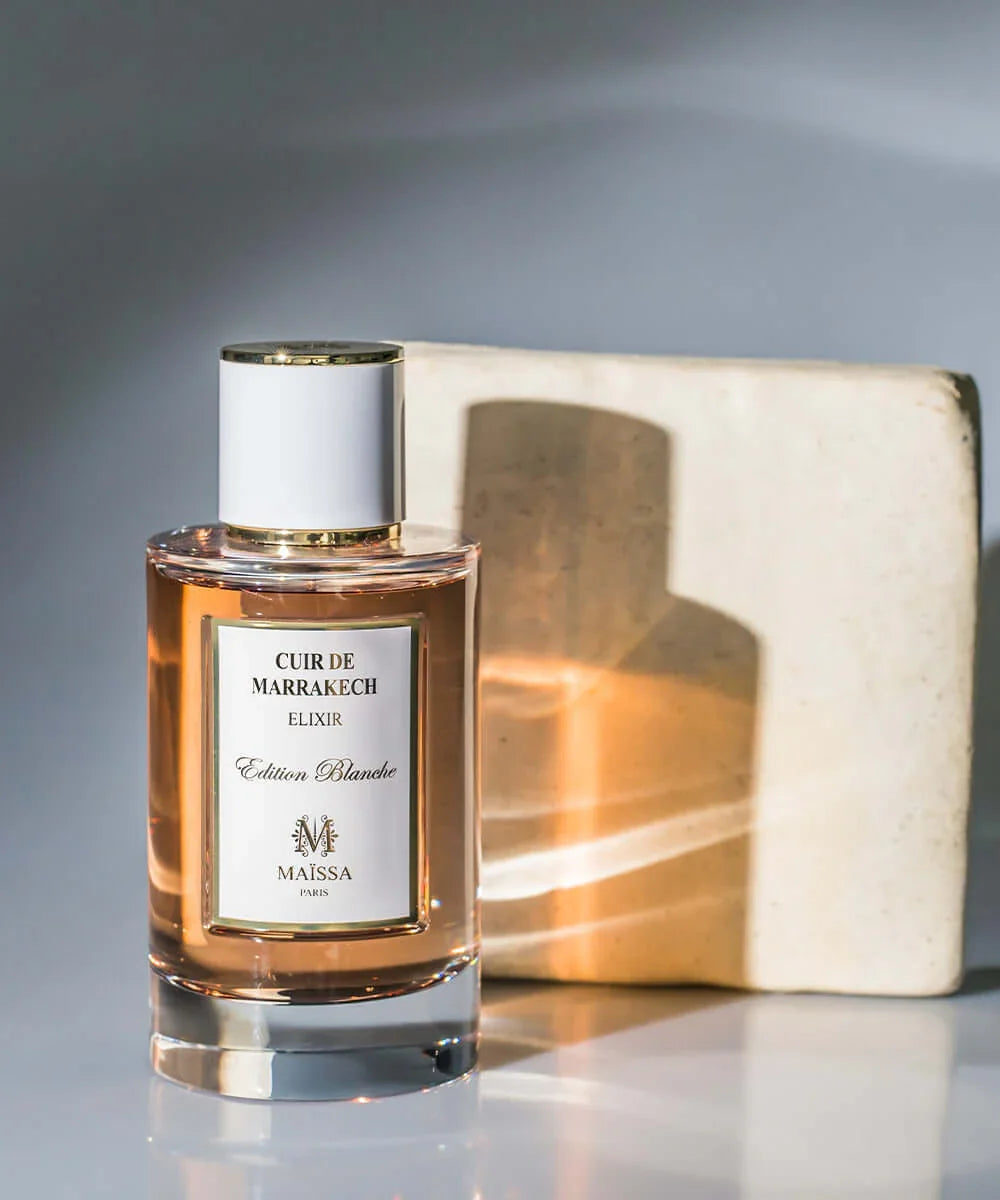 100ml glass bottle of Cuir de Marrakech Maïssa oriental leather perfume on a clean background — view 2