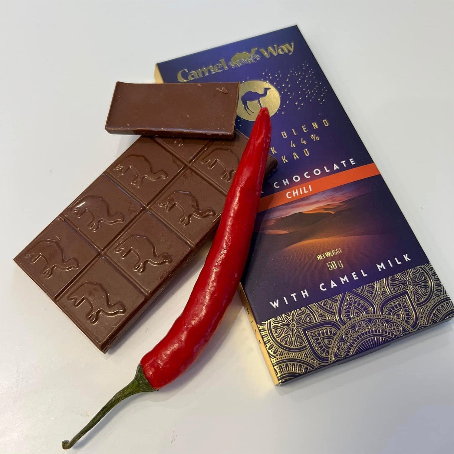 Handmade camel milk chocolate with chilli bar in premium artisanal packaging — view 2