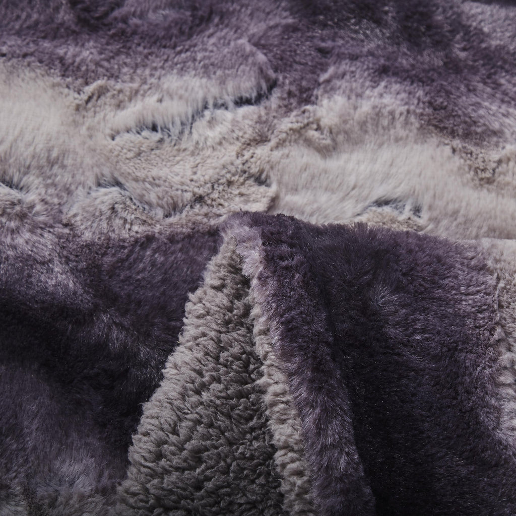 Luxury black striped faux fur throw blanket draped gracefully over a sofa with thick sherpa fleece — view 4