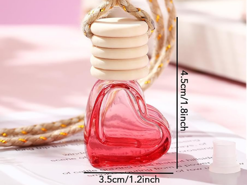 Glass hanging car freshener bottle with wooden cap and hanging rope, showcasing amber liquid inside. — view 4