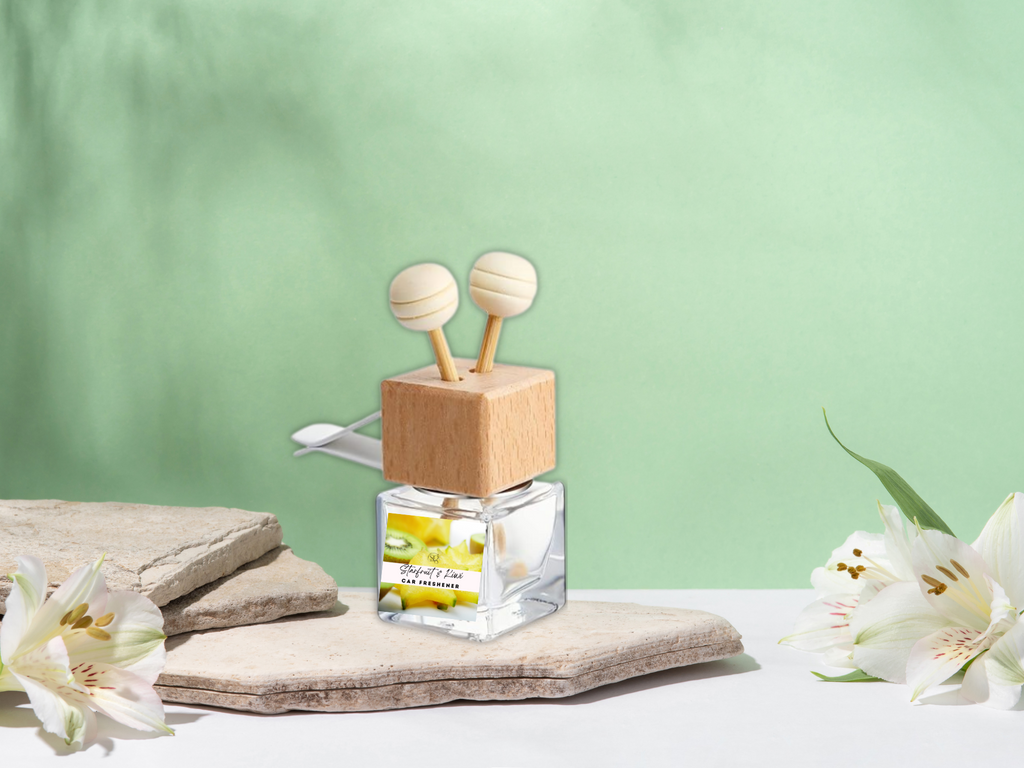 Glass car vent diffuser with wooden cap and scent sticks, filled with fruity fragrance oil — view 3