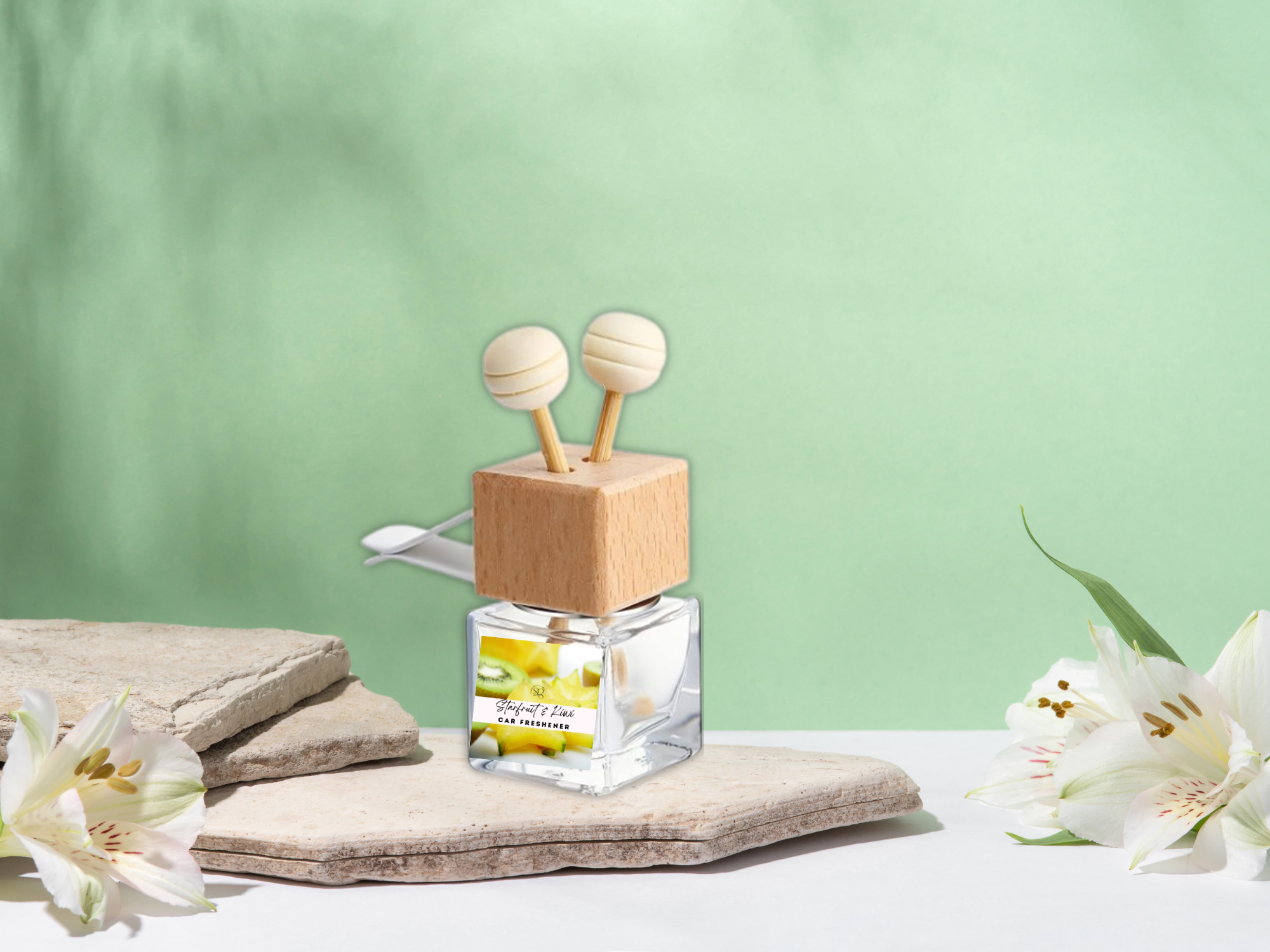 Glass car vent diffuser with wooden cap and scent sticks, filled with fruity fragrance oil — view 3