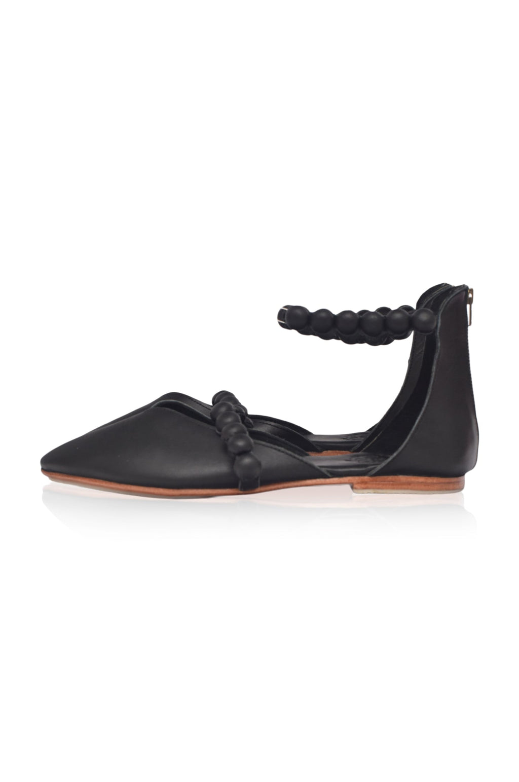 Black genuine leather ankle strap ballet flats with pointed toe and leather-wrapped buttons — view 3