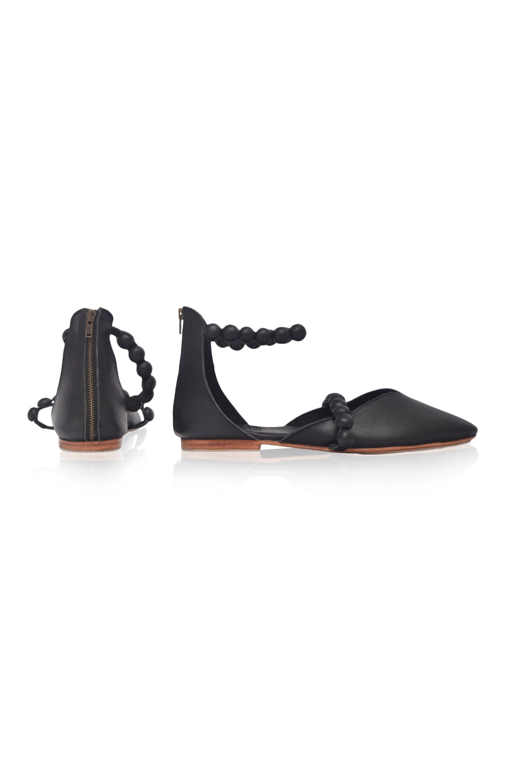 Black genuine leather ankle strap ballet flats with pointed toe and leather-wrapped buttons — view 5