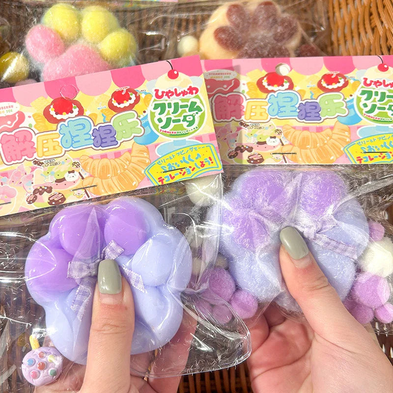 Cat paw mochi squishy fidget toy, soft and adorable animal shaped stress ball for relaxation. — view 5