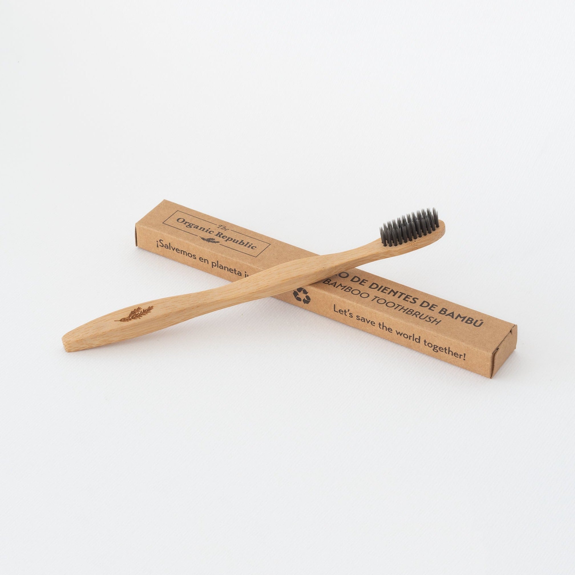 Eco-friendly bamboo toothbrush with soft whitening bristles and a natural wooden handle