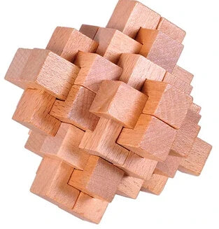 Classic wooden puzzle with four colorful geometric cubes displayed in a custom rectangular wood frame — view 4