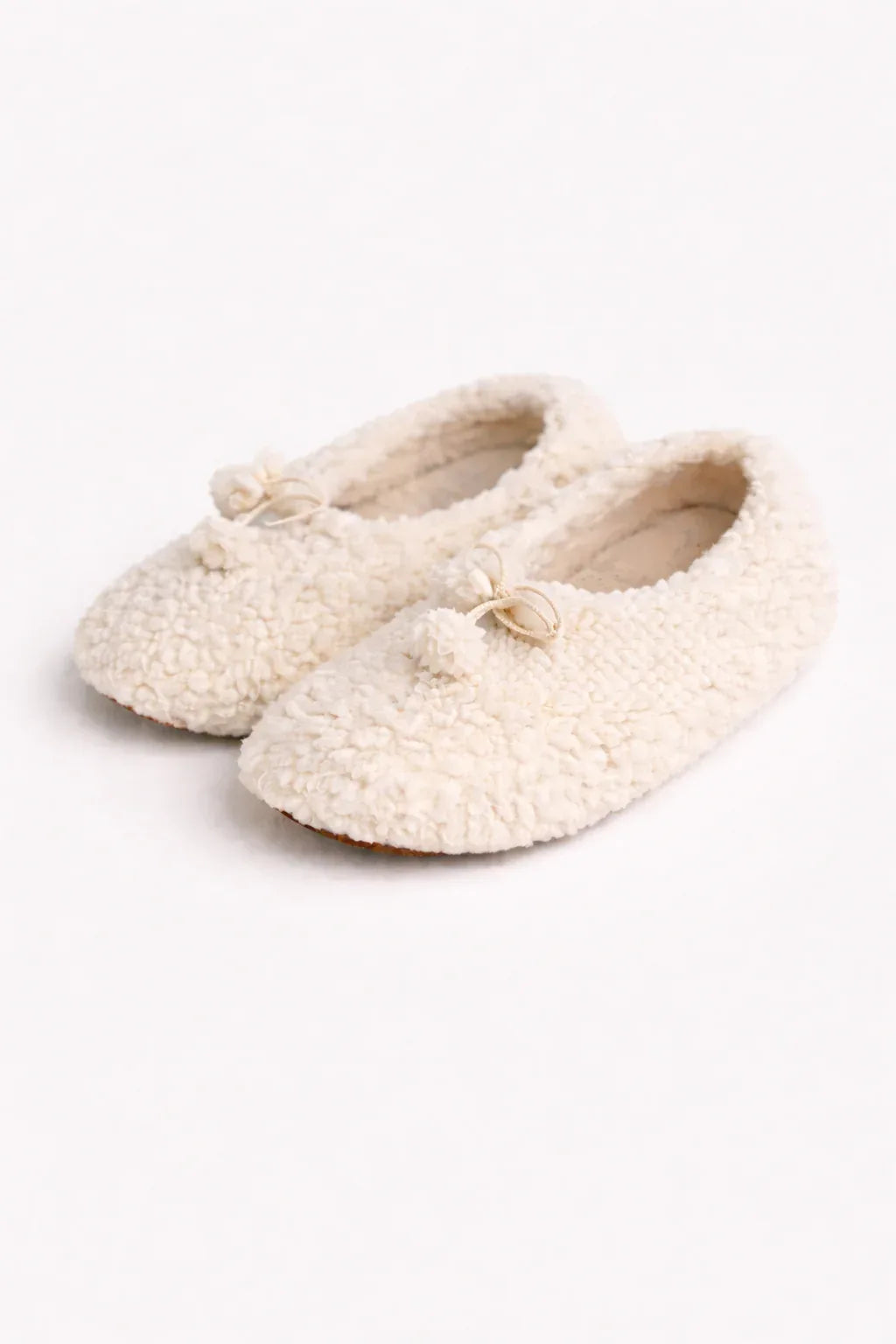 White natural wool adult slippers with a premium cork insole and genuine leather sole