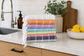 Lightweight organic Turkish cotton hand towel featuring natural fringe detailing for modern bathroom and travel use