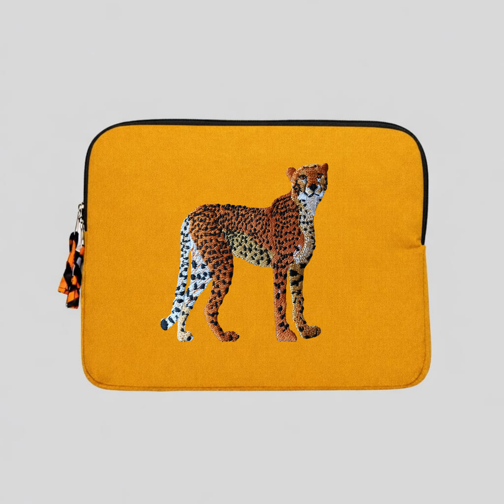 Handmade cotton canvas cheetah laptop sleeve in warm earthy tones featuring detailed animal embroidery — view 3