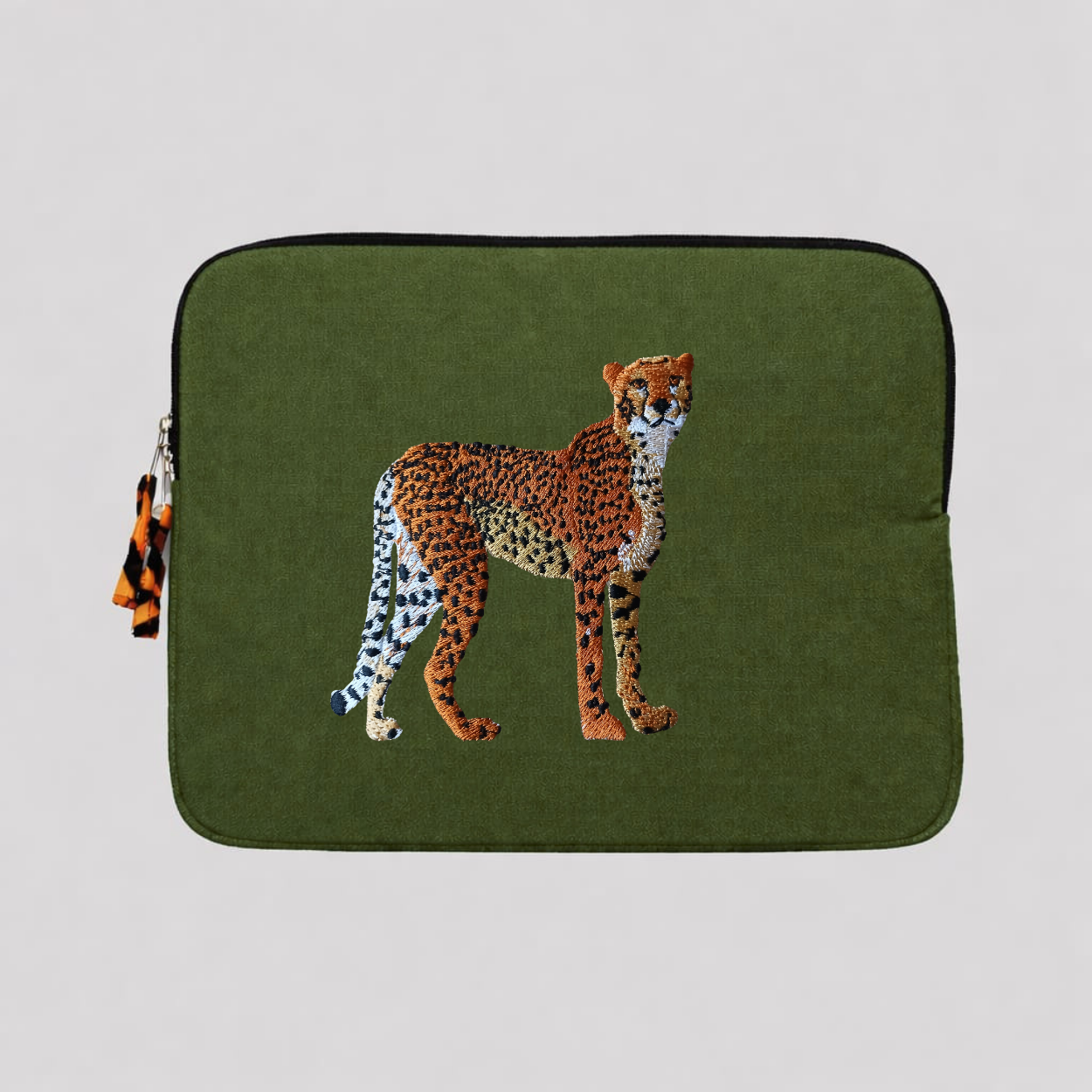 Handmade cotton canvas cheetah laptop sleeve in warm earthy tones featuring detailed animal embroidery — view 4