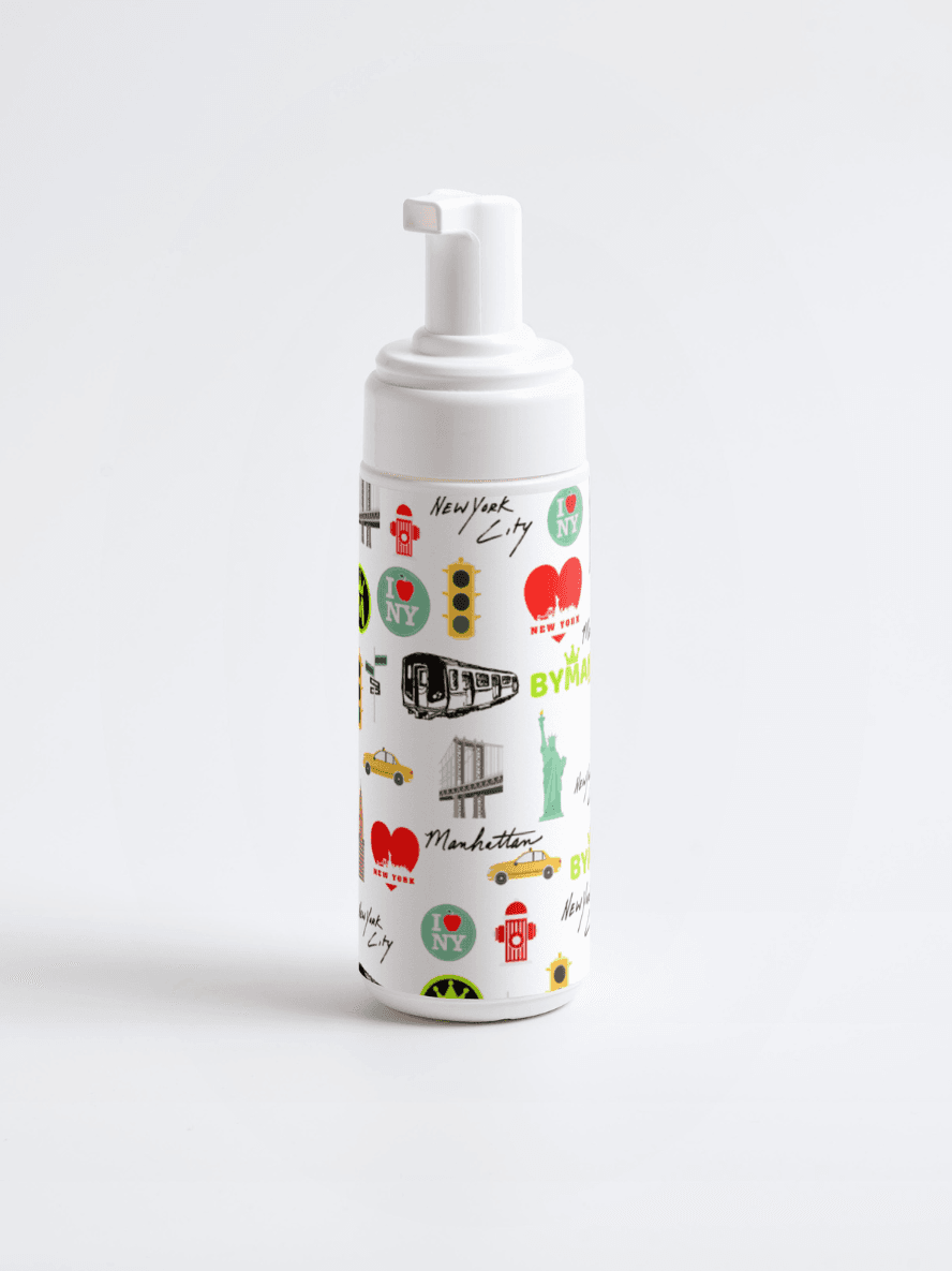 Cleansing foam makeup remover bottle with minimalist design, showcasing natural vegan skincare for daily use.