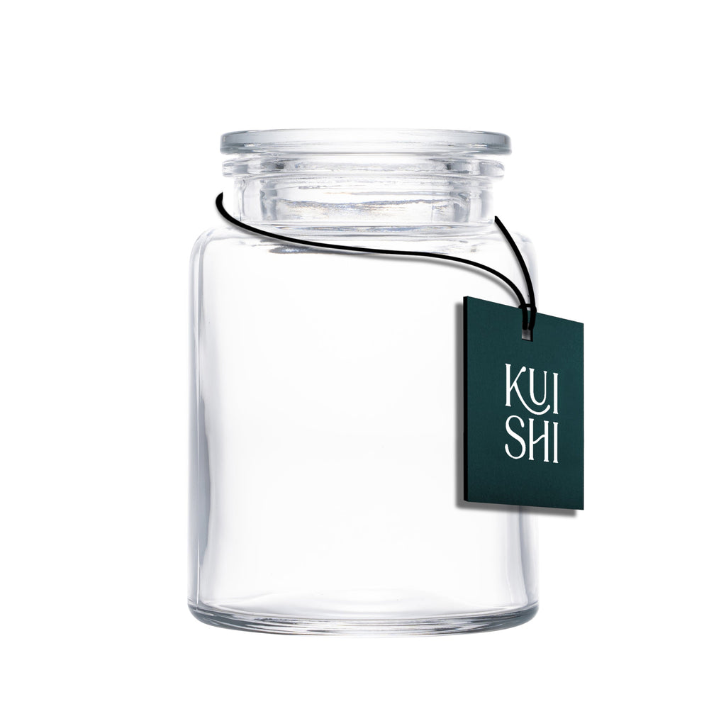 Amber glass apothecary storage jars with wide mouth for organizing bathroom essentials on a vanity — view 3