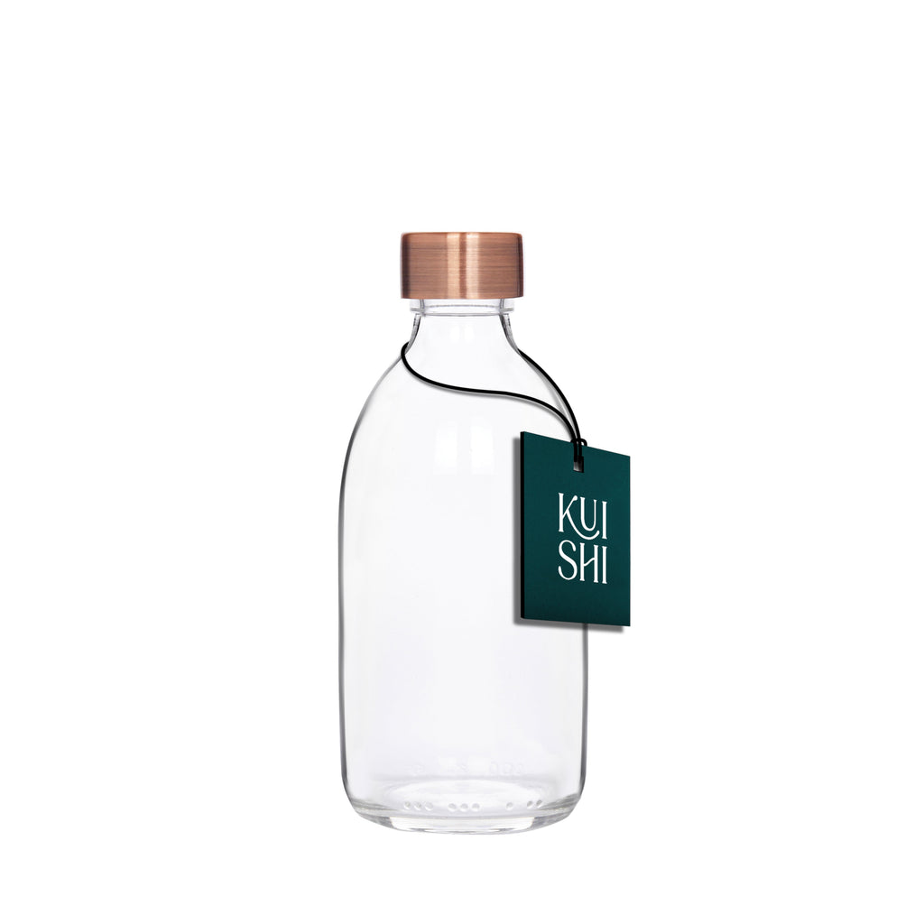 Clear glass storage bottle with a silver stainless steel screw cap for household organization — view 4