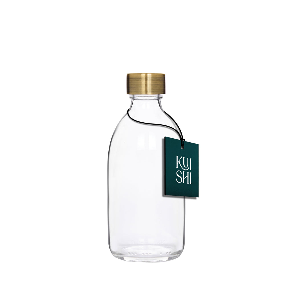 Clear glass storage bottle with a silver stainless steel screw cap for household organization — view 3