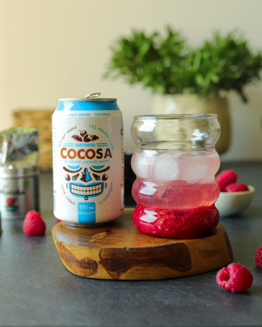 Clear refreshing Cocosa coconut water in a 330ml container for natural electrolyte sports hydration — view 4