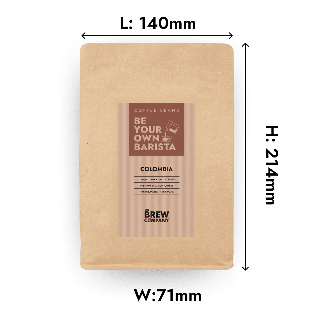 Freshly roasted Colombia Tolima whole coffee beans displayed in an eco-friendly kraft paper bag. — view 2