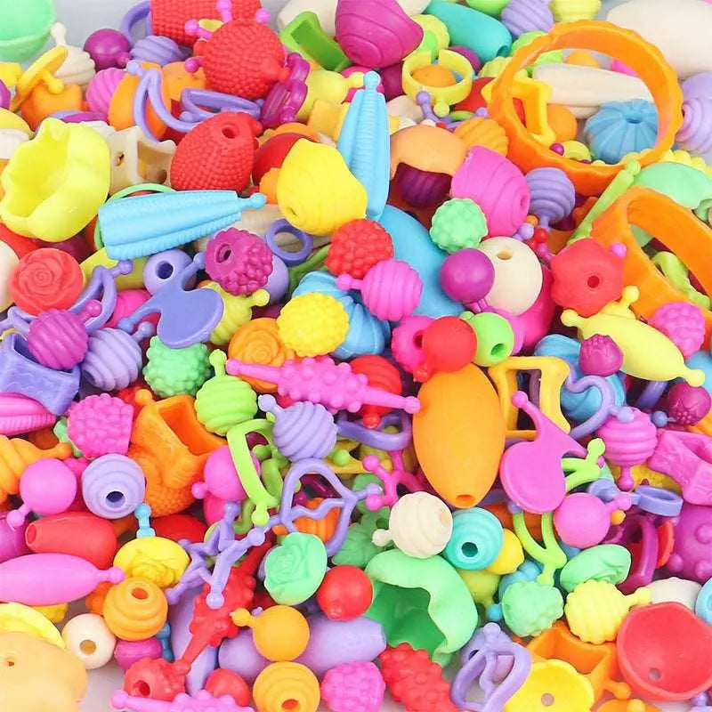 Colorful DIY bead craft kit with 600 vibrant plastic pieces in a clear storage box — view 2
