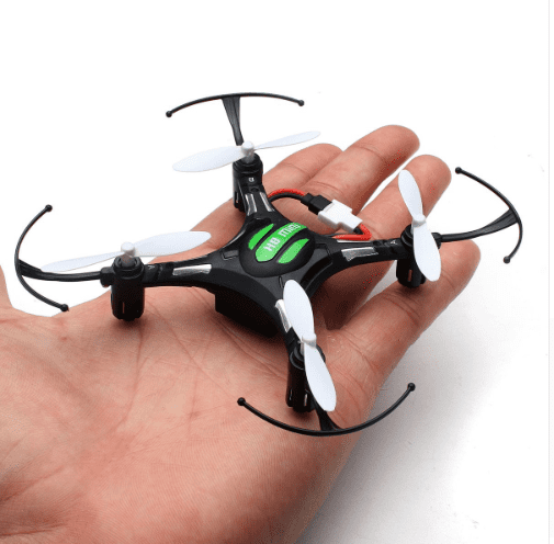 Compact mini quadcopter drone featuring a lightweight portable four axis design for outdoor flights — view 2