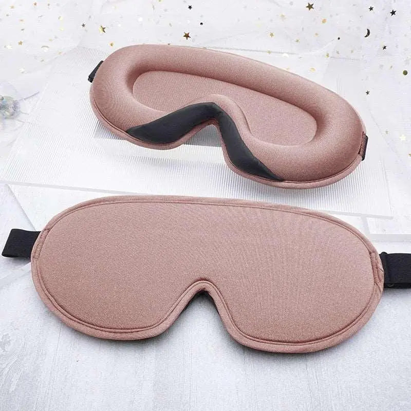 Black 3D contoured memory foam sleep mask with adjustable strap for total darkness