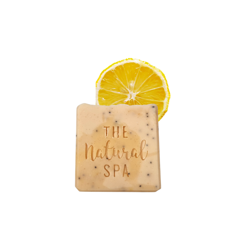 Lemon sorbet handmade natural soap bar with poppy seeds, showcasing a textured yellow botanical finish. — view 4