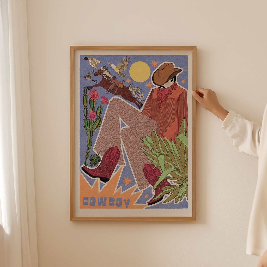 Retro Cowboy Art Print featuring a rugged cowboy, desert plants, and a classic horse
