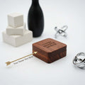 Custom engraved wooden jewelry box with natural finish and soft linen interior for earrings