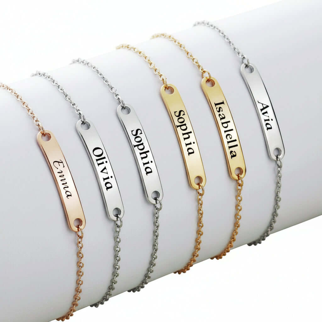 Custom engraved name bracelet in polished stainless steel showcasing personalized text on a delicate chain — view 2