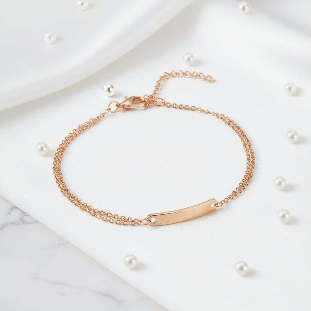 Custom engraved name bracelet in polished stainless steel showcasing personalized text on a delicate chain — view 4