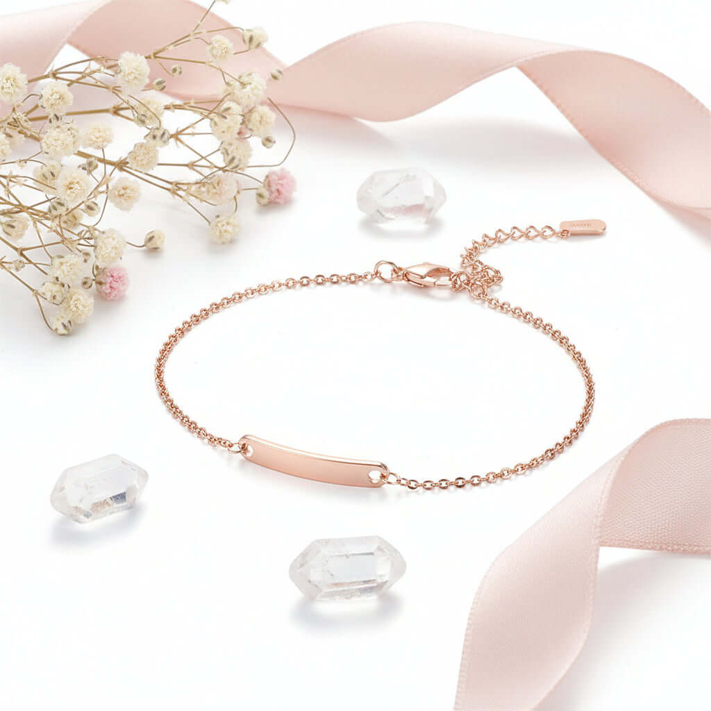 Custom engraved name bracelet in polished stainless steel showcasing personalized text on a delicate chain — view 5